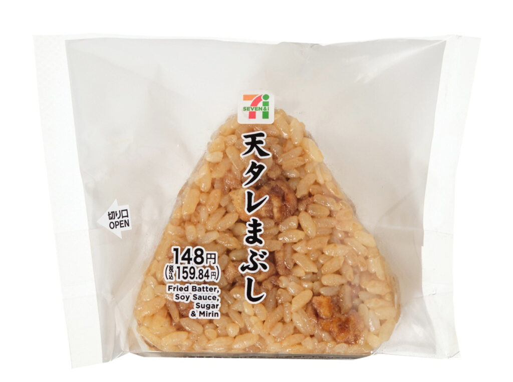 セブンイレブンの天タレまぶしおむすびを比較する。税込価格：160円、カロリー：276kcal、1円あたりカロリー：1.73kcal/円、たんぱく質：4g、1円あたりたんぱく質：0.03g/円、脂質：5.9g、炭水化物：52.9g、糖質：50.7g、食物繊維：2.2g、食塩相当量：1.7g。甘じょっぱいタレが染みた天かすを混ぜ込んだおむすびです。鰹だしが香る、やみつき感のある味わいです。アレルギー：小麦。