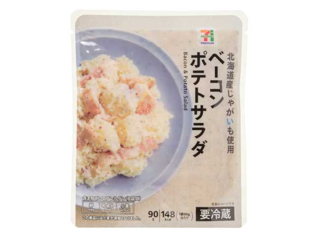 セブンイレブンの７プレミアム ベーコンポテトサラダ。税込価格：171円、カロリー：148kcal、たんぱく質：3.4g、脂質：8.7g、炭水化物：14.5g、糖質：13.4g、食物繊維：1.1g、食塩相当量：1g。北海道産じゃがいもを使用し、にんにくの風味をきかせたベーコンポテトサラダです。アレルギー：卵、乳、小麦。