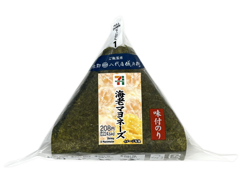セブンイレブンの味付のりおにぎり 海老マヨネーズを比較する。税込価格：225円、カロリー：214kcal、1円あたりカロリー：0.95kcal/円、たんぱく質：4.3g、1円あたりたんぱく質：0.02g/円、脂質：5.9g、炭水化物：36.7g、糖質：34.9g、食物繊維：1.8g、食塩相当量：1g。人気のある海老マヨネーズを味付海苔で包んだおにぎりです。アレルギー：卵、乳、小麦、えび。
