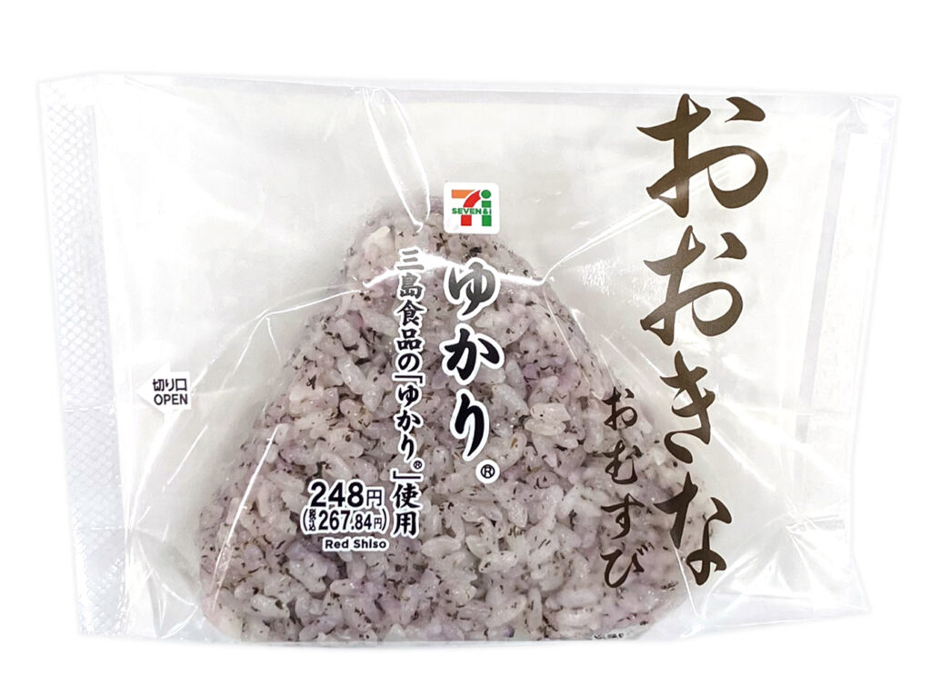 セブンイレブンのおおきなおむすび ゆかりを比較する。税込価格：268円、カロリー：257kcal、1円あたりカロリー：0.96kcal/円、たんぱく質：4.5g、1円あたりたんぱく質：0.02g/円、脂質：1.8g、炭水化物：56.9g、糖質：54.4g、食物繊維：2.5g、食塩相当量：2.5g。旨み感じるだし飯にゆかりを混ぜ込んだおむすびです。