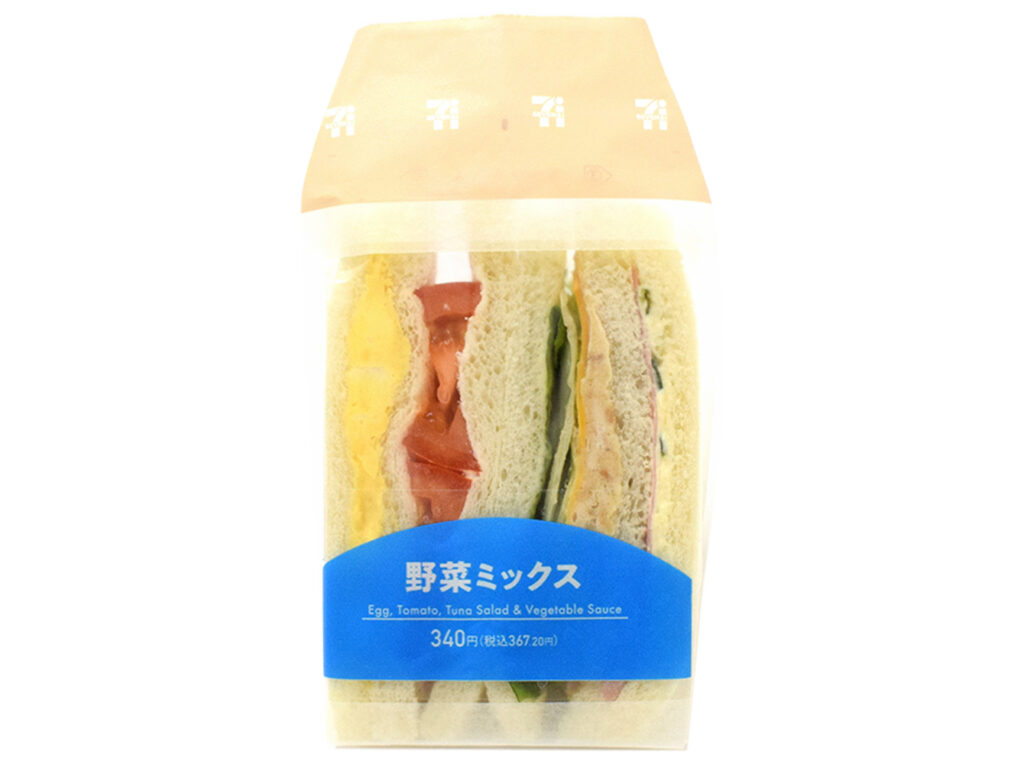 野菜ミックスサンド セブンイレブン ２種類のサラダ（ツナサラダ，胡瓜サラダ）とトマトやレタスなどの野菜，チーズ，ハムなど様々な具材を味わえるミックスサンドです。