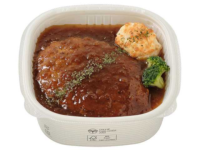 セブンイレブンのおろし玉ねぎソースのハンバーグ丼を比較する。税込価格：689円、カロリー：637kcal、1円あたりカロリー：0.92kcal/円、たんぱく質：23.8g、1円あたりたんぱく質：0.03g/円、脂質：16.7g、炭水化物：102.1g、糖質：93.8g、食物繊維：8.3g、食塩相当量：2.1g。鉄板でふっくらジューシーに焼き上げたハンバーグをおろし玉ねぎソースで食べる、ハンバーグ弁当です。アレルギー：卵、乳、小麦。
