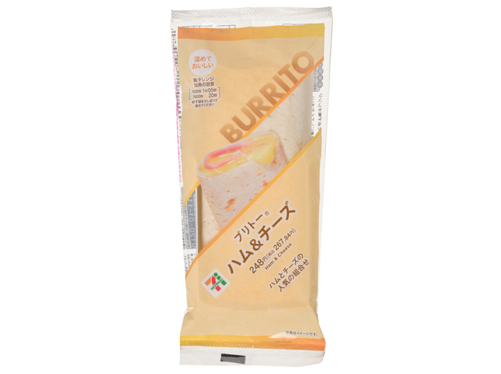 セブンイレブンのブリトーハム＆チーズを比較する。税込価格：268円、カロリー：271kcal、1円あたりカロリー：1.01kcal/円、たんぱく質：15.7g、1円あたりたんぱく質：0.06g/円、脂質：11.2g、炭水化物：27.3g、糖質：26.2g、食物繊維：1.1g、食塩相当量：1.3g。ハムとチーズの人気の組み合わせのブリトーです。アレルギー：卵、乳、小麦。