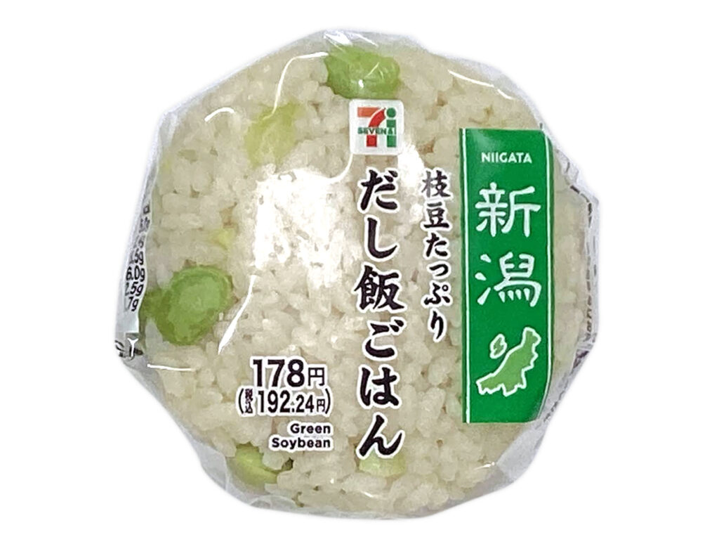 セブンイレブンの枝豆たっぷり だし飯おむすびを比較する。税込価格：192円、カロリー：191kcal、1円あたりカロリー：0.99kcal/円、たんぱく質：5g、1円あたりたんぱく質：0.03g/円、脂質：2.4g、炭水化物：38.5g、糖質：36g、食物繊維：2.5g、食塩相当量：1.7g。地域の定番「枝豆おむすび」の枝豆を増量した、食べ応えあるおにぎり。アレルギー：卵、小麦。
