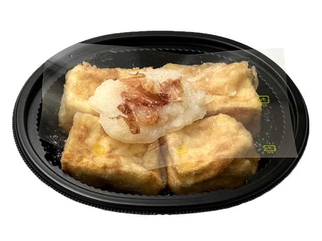 セブンイレブンの揚げだし豆腐を比較する。税込価格：419円、カロリー：263kcal、1円あたりカロリー：0.63kcal/円、たんぱく質：17.2g、1円あたりたんぱく質：0.04g/円、脂質：16.7g、炭水化物：11.8g、糖質：10.2g、食物繊維：1.6g、食塩相当量：2g。なめらかな食感の絹ごし豆腐を使った揚げだし豆腐に大根おろしとかつお節を盛り付けました。アレルギー：小麦。