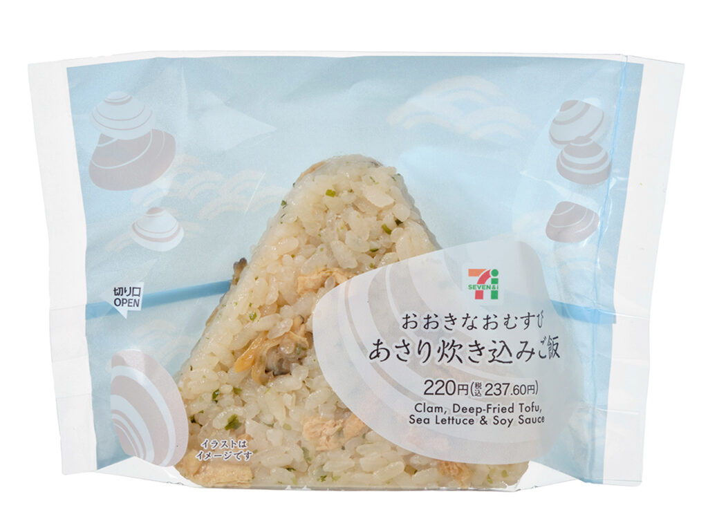 セブンイレブンのおおきなおむすび あさり炊き込みご飯を比較する。税込価格：238円、カロリー：275kcal、1円あたりカロリー：1.16kcal/円、たんぱく質：8.9g、1円あたりたんぱく質：0.04g/円、脂質：2.6g、炭水化物：55g、糖質：52.8g、食物繊維：2.2g、食塩相当量：2.6g。あさり，油揚げ，あおさを使用した炊き込みご飯のおむすびです。アレルギー：小麦、かに。