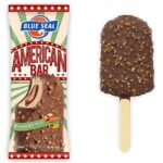 セブンイレブンのアメリカンバーキャラメル＆ピーナッツを比較する。税込価格：194円。アレルギー：乳。