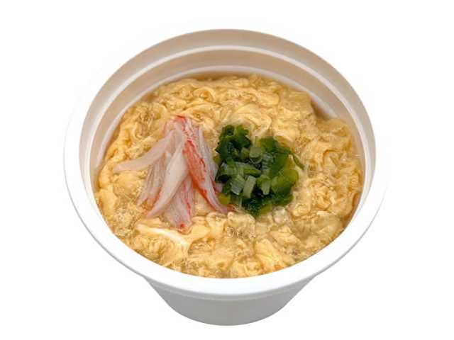 セブンイレブンの鶏ガラだしの旨み ふんわり玉子スープ。税込価格：322円、カロリー：141kcal、たんぱく質：11.9g、脂質：6.4g、炭水化物：9.2g、糖質：8.9g、食物繊維：0.3g、食塩相当量：2.8g。和風の鶏だしベースにふんわりと仕上げた玉子入りのスープと春雨を組み合わせた商品です。アレルギー：卵、小麦、かに。