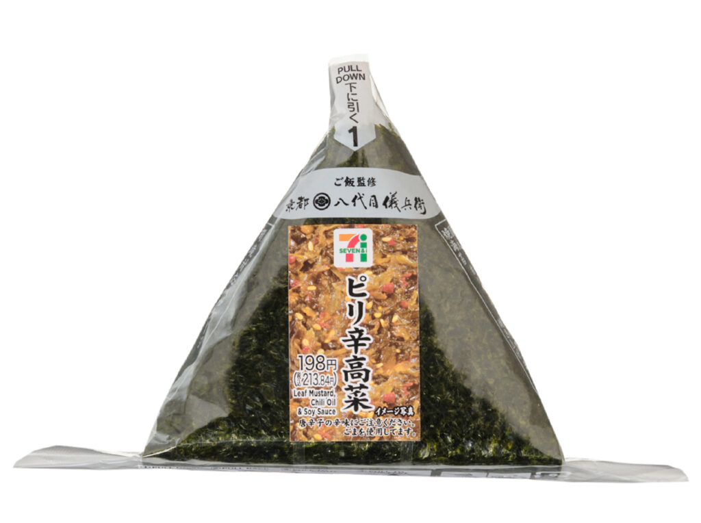 セブンイレブンの手巻おにぎり ピリ辛高菜を比較する。税込価格：214円、カロリー：170kcal、1円あたりカロリー：0.79kcal/円、たんぱく質：3.4g、1円あたりたんぱく質：0.02g/円、脂質：1.4g、炭水化物：37.1g、糖質：34.8g、食物繊維：2.3g、食塩相当量：1.4g。ピリッとした辛味がアクセントの高菜を中具にした、パリッとした海苔を巻いて食べる手巻おにぎりです。アレルギー：小麦。