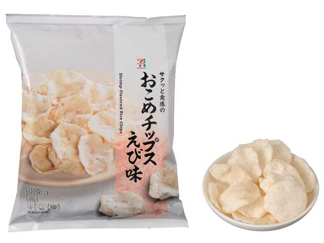 セブンイレブンのセブンプレミアム おこめチップスえび味。税込価格：108円、カロリー：164kcal、たんぱく質：1.9g、脂質：10.7g、炭水化物：15.1g、糖質：14.9g、食物繊維：0.2g、食塩相当量：0.4g。国産米を使用した、ふんわりしつつサクっとした食感のお米チップスです。シンプルなえび味で食べ進み抜群です。アレルギー：えび。