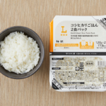 ローソンのコシヒカリごはん 2食パックを比較する。税込価格：278円、カロリー：173kcal、1円あたりカロリー：0.62kcal/円、たんぱく質：2.9g、1円あたりたんぱく質：0.01g/円、脂質：0.5g、炭水化物：39.5g、糖質：38.8g、食物繊維：0.7g、食塩相当量：0g。