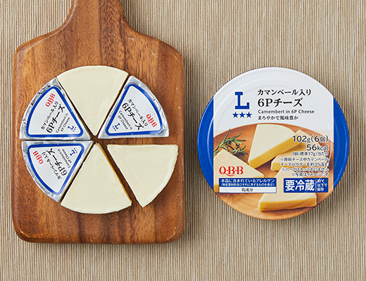 ローソンのカマンベール入り6Pチーズを比較する。税込価格：297円、カロリー：56kcal、1円あたりカロリー：0.19kcal/円、たんぱく質：2.8g、1円あたりたんぱく質：0.01g/円、脂質：4.8g、炭水化物：0.4g、糖質：0.4g、食物繊維：0g、食塩相当量：0.5g。