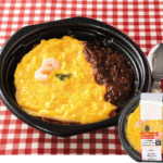 ローソンのグリル満天星お墨付き オムライス。税込価格：697円、カロリー：559kcal、たんぱく質：20.1g、脂質：24.4g、炭水化物：67g、糖質：62.3g、食物繊維：4.7g、食塩相当量：5.1g。