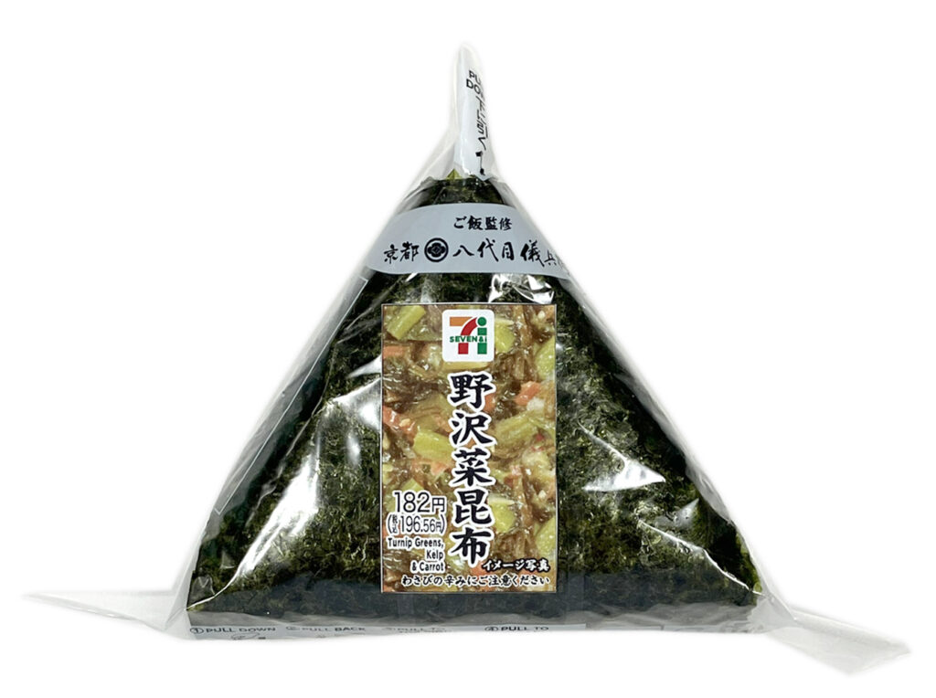 セブンイレブンの手巻おにぎり 野沢菜昆布を比較する。税込価格：197円、カロリー：170kcal、1円あたりカロリー：0.86kcal/円、たんぱく質：3.1g、1円あたりたんぱく質：0.02g/円、脂質：1.3g、炭水化物：37.6g、糖質：35.4g、食物繊維：2.2g、食塩相当量：1.4g。醤油で炒め煮にした野沢菜、昆布を中具に使用しました。風味と食感が楽しめる手巻おにぎりです。アレルギー：小麦。