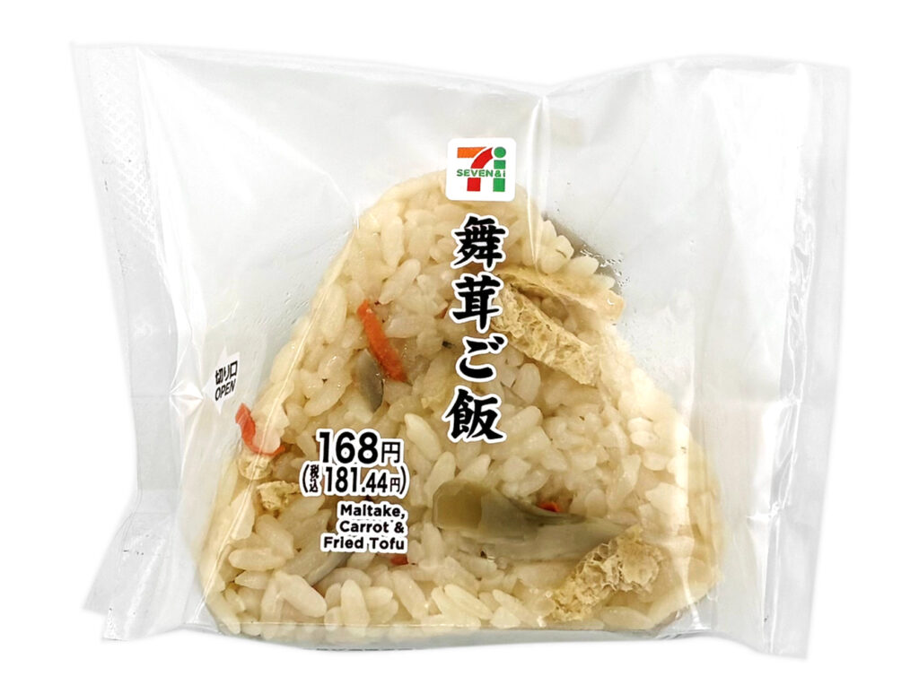 セブンイレブンの舞茸ご飯おむすびを比較する。税込価格：181円、カロリー：213kcal、たんぱく質：3.6g、脂質：1.1g、炭水化物：48.2g、糖質：46.1g、食物繊維：2.1g、食塩相当量：1.7g。舞茸，人参，油揚げを混ぜ込んだ、混ぜ飯おむすびです。アレルギー：小麦。